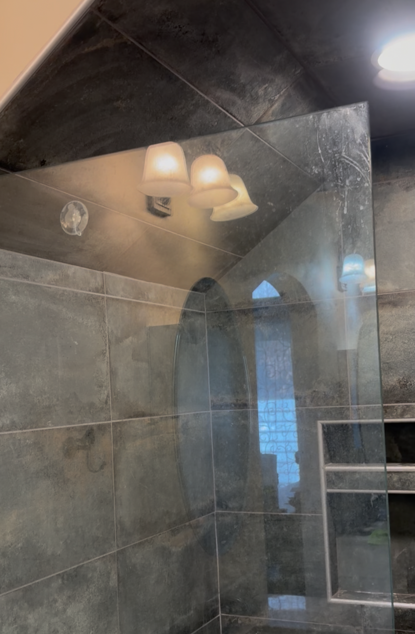 Before photo of glass shower door
